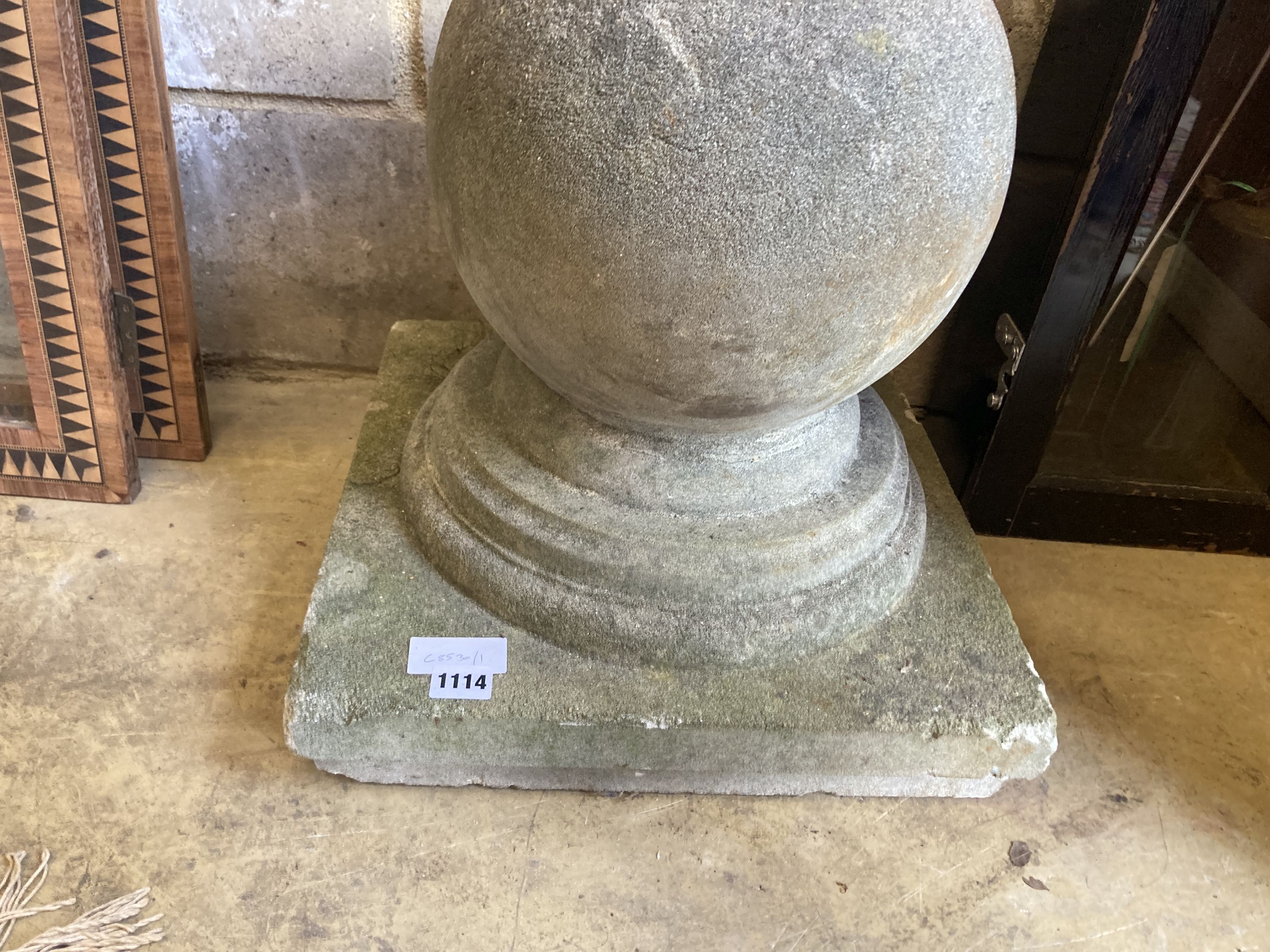 A reconstituted stone ball finial, width 40cm, depth 40cm, height 44cm